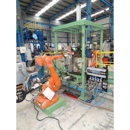 RIM TO LUG WELDING SYSTEM WITH TWIN ROBOTS AND LASER TRACKING SYSTEM