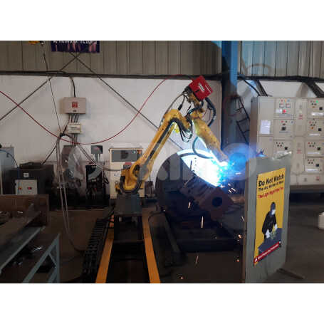 ROCK BREAKER ROBOTIC WELDING WORKCELL WITH SLIDER AND POSITIONER
